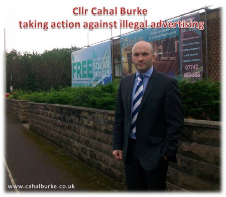 Cllr Cahal Burke targets illegal advertising.
